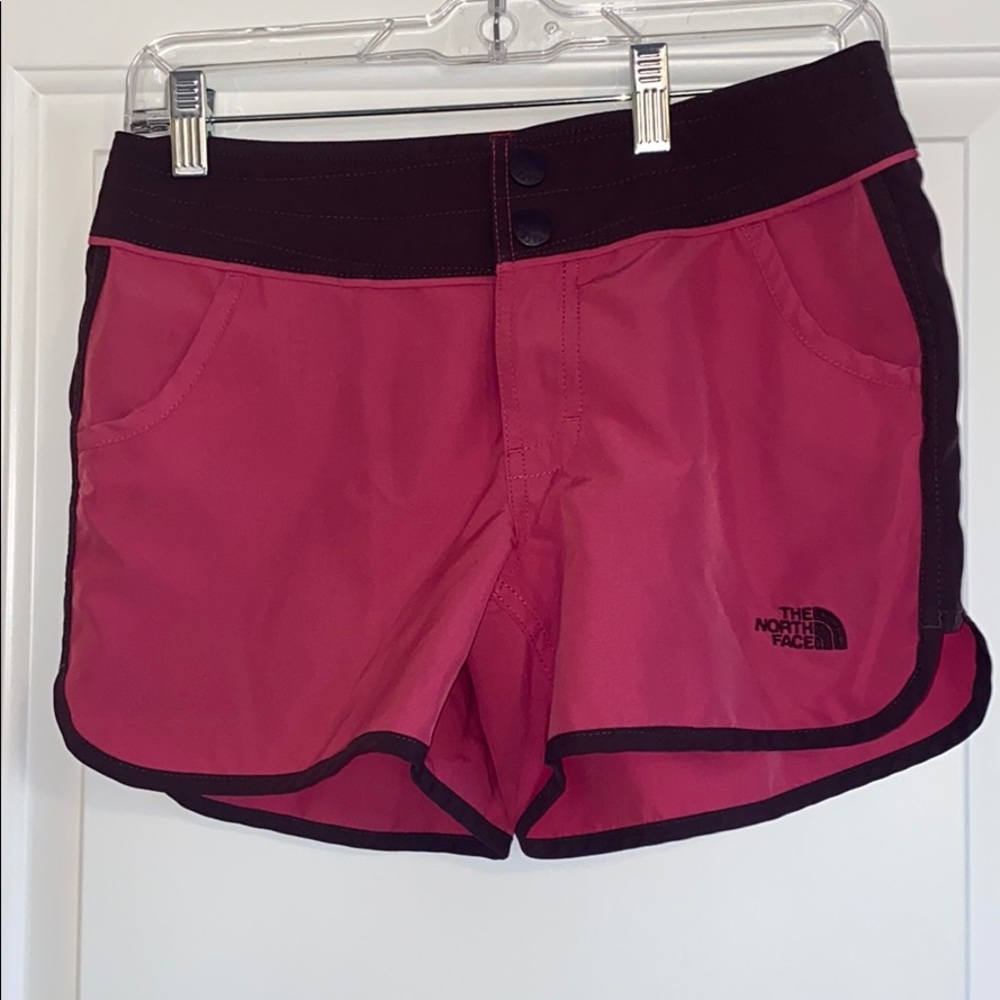 Women’s North Face pink and burgundy shorts size 4